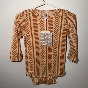 Kate Quinn Tan and Orange Patterned Baby Bodysuit